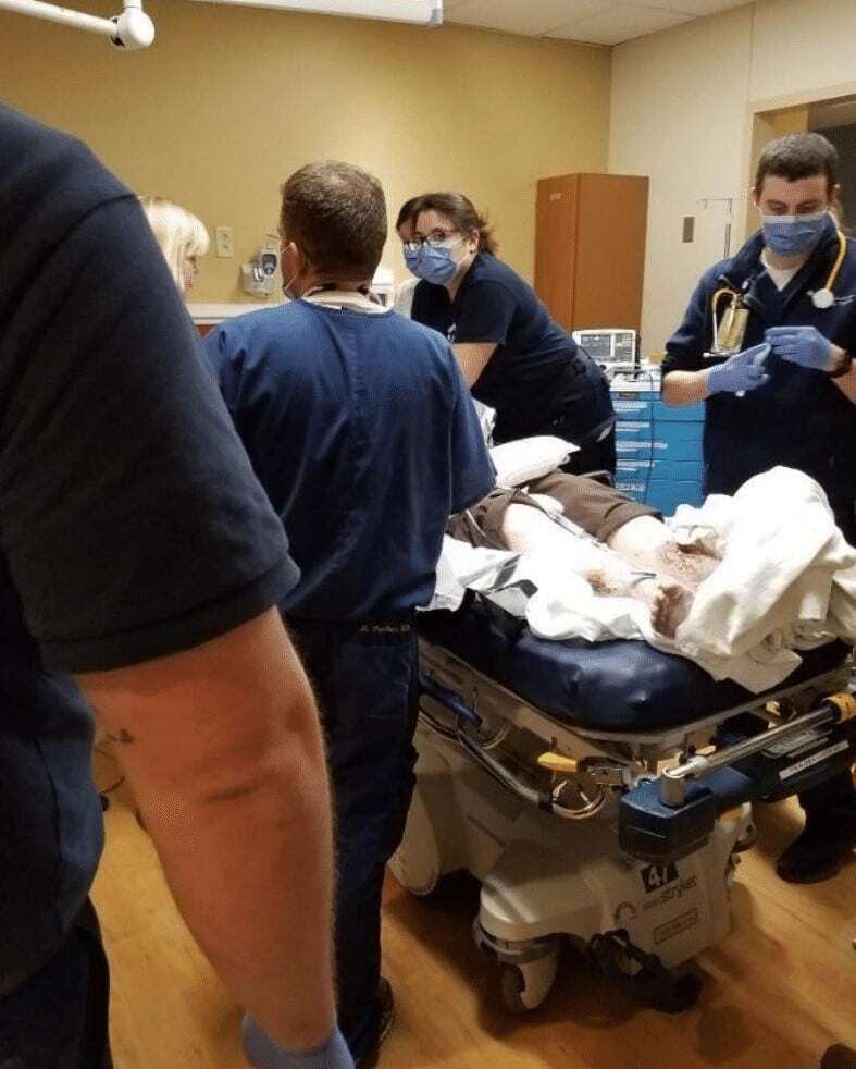 “Rescuer preparing medication.”