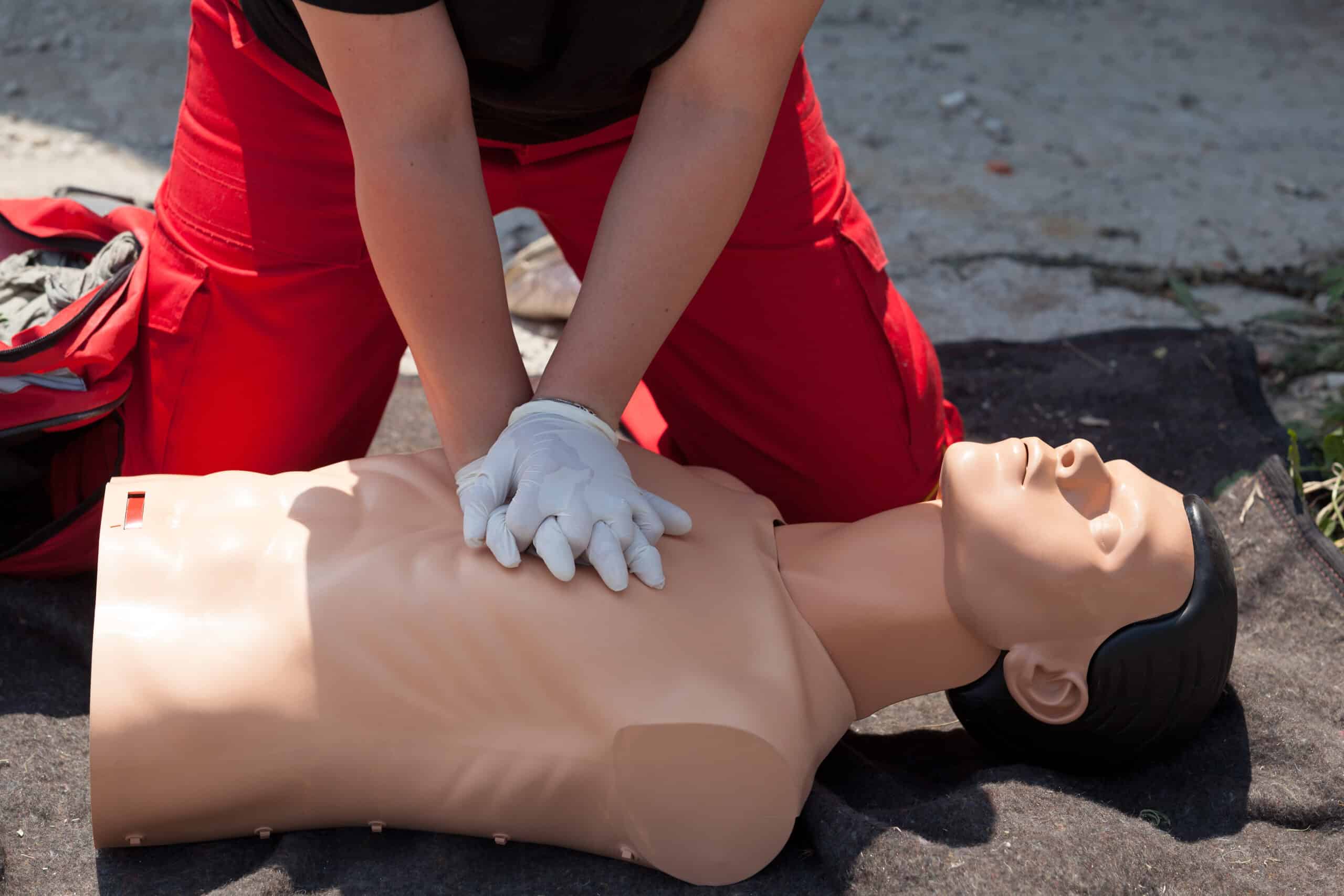 Man performing chest compressions.