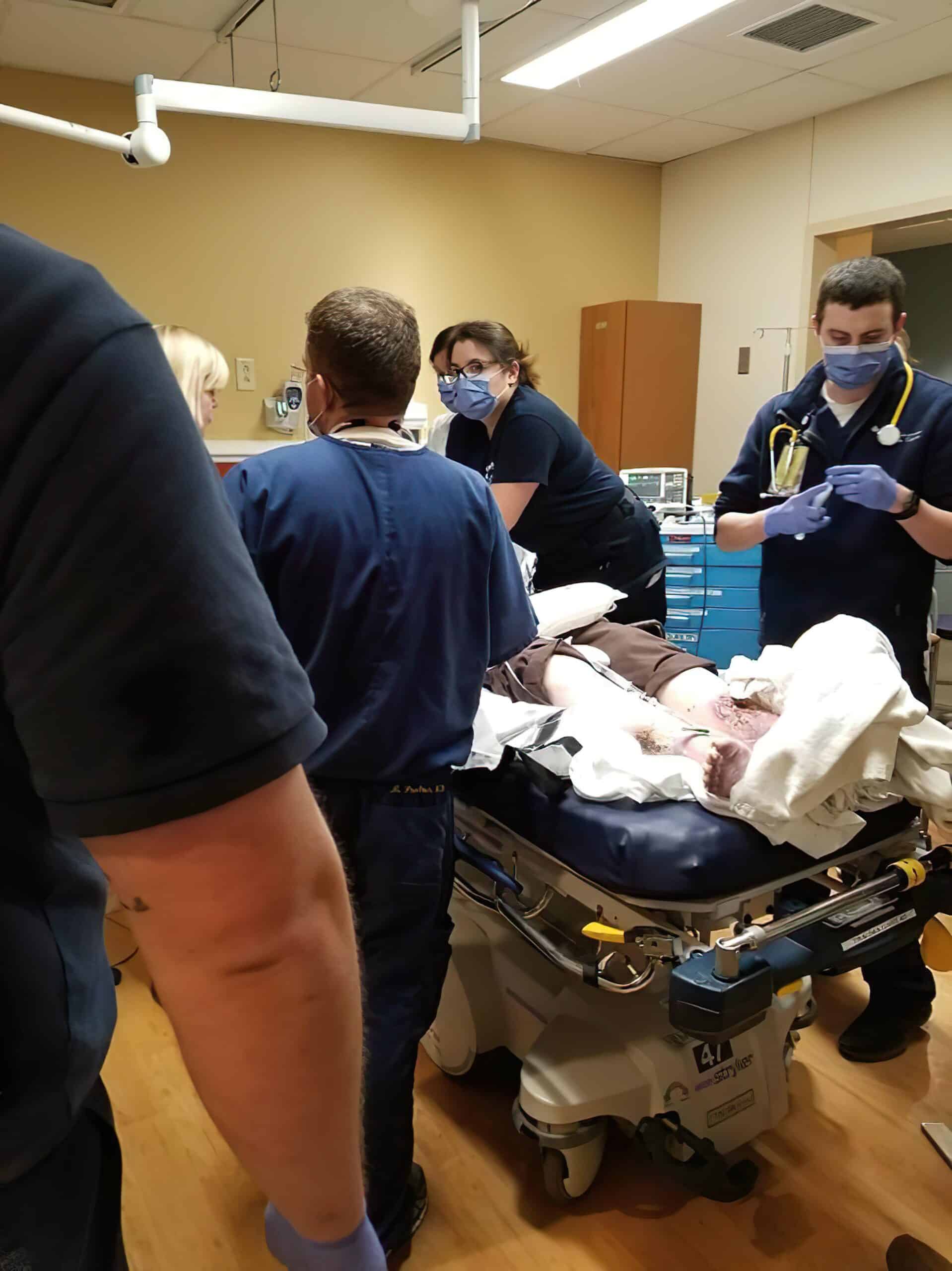 Rescuer preparing medication.