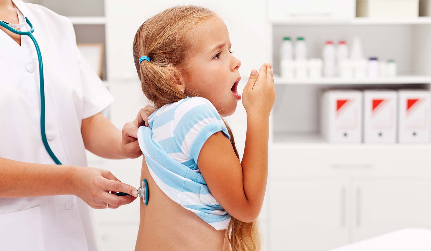 Clinician auscultates child’s breath sounds.