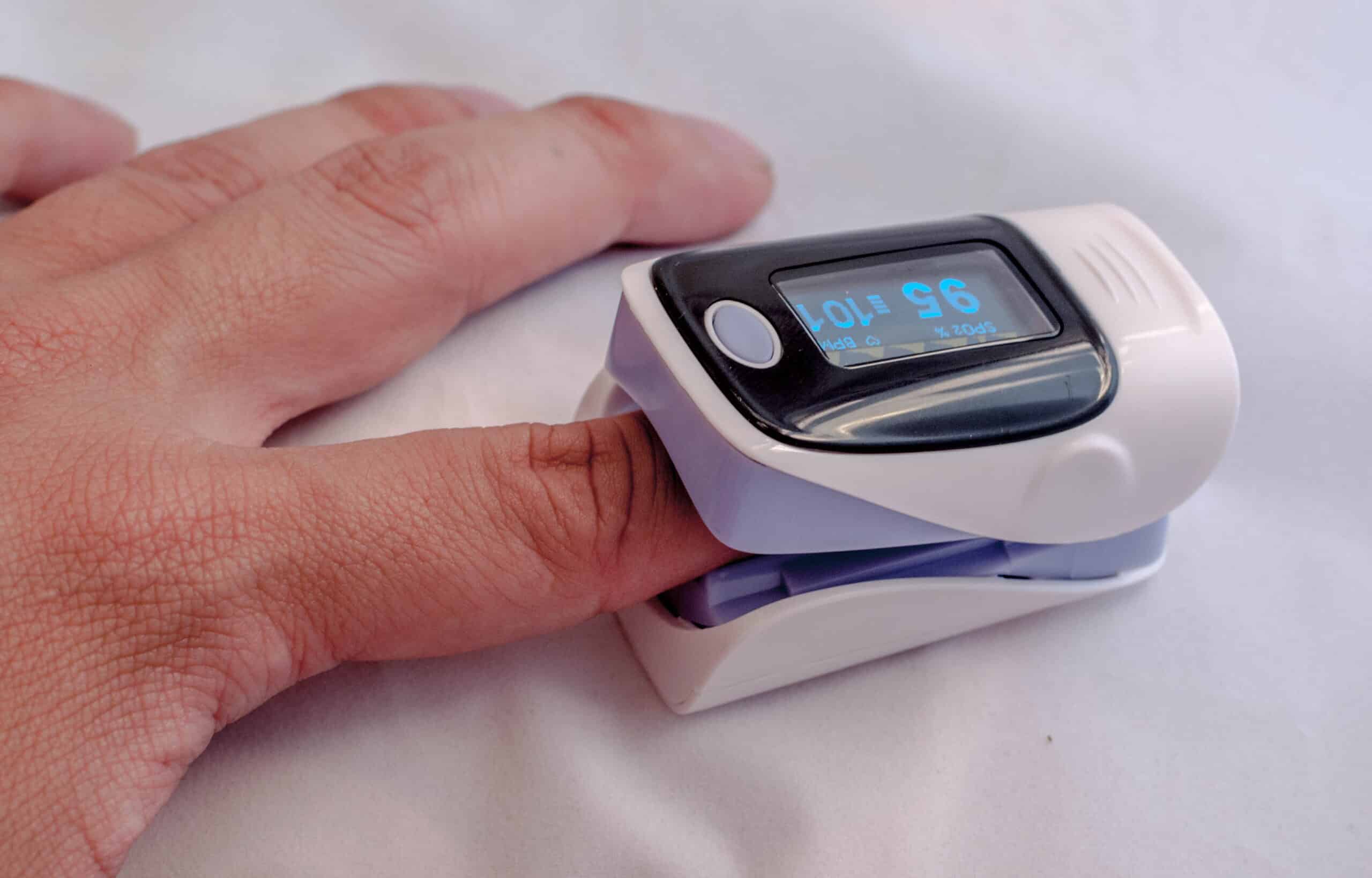 Pulse oximeter measures oxygen saturation.