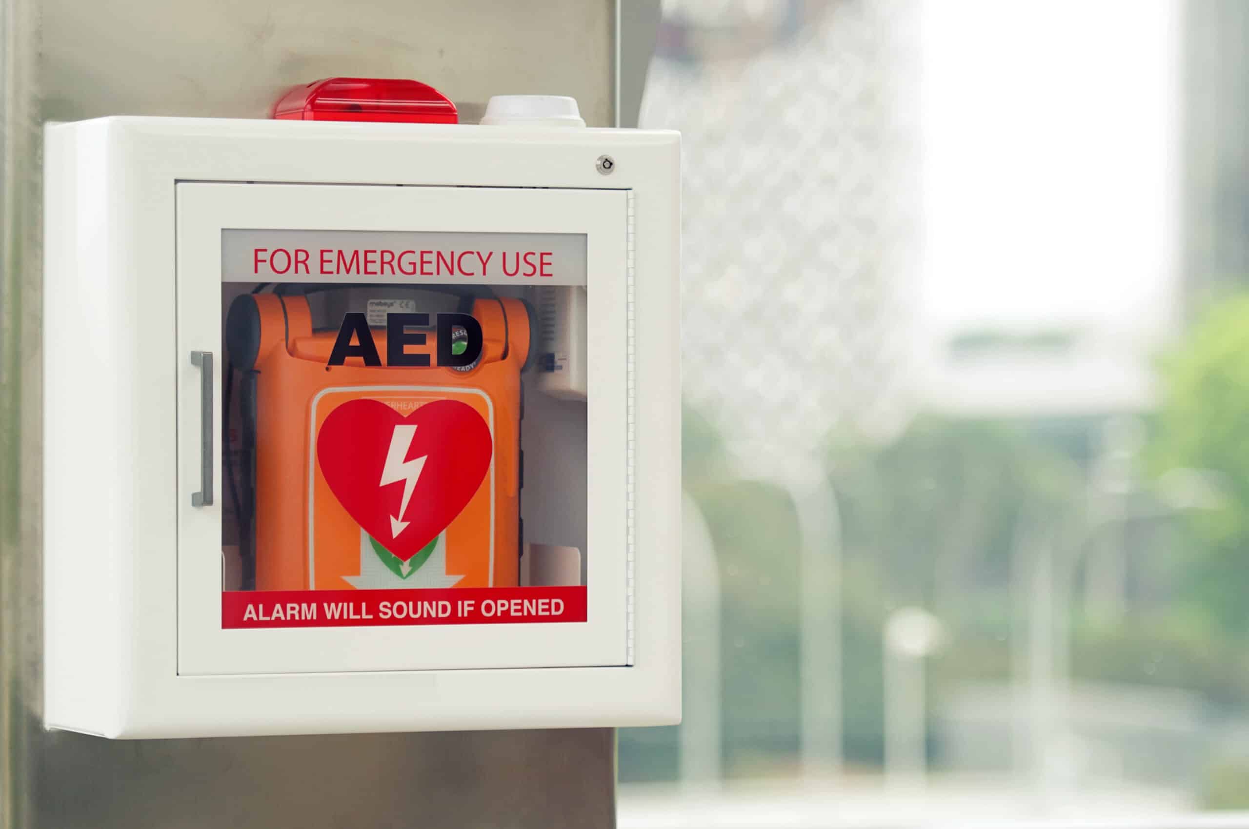 AED hanging on wall.
