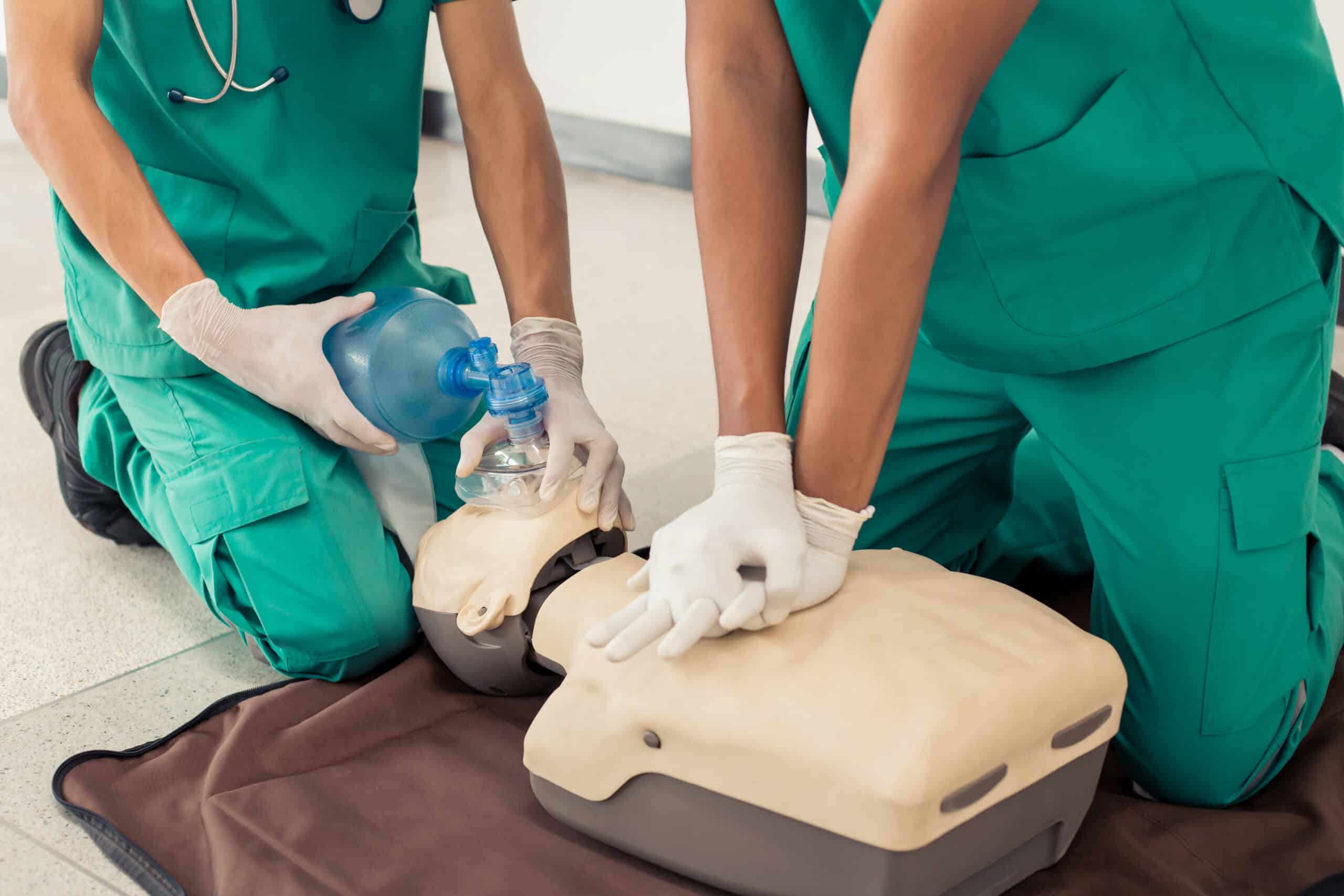 Conventional CPR with rescue breaths.