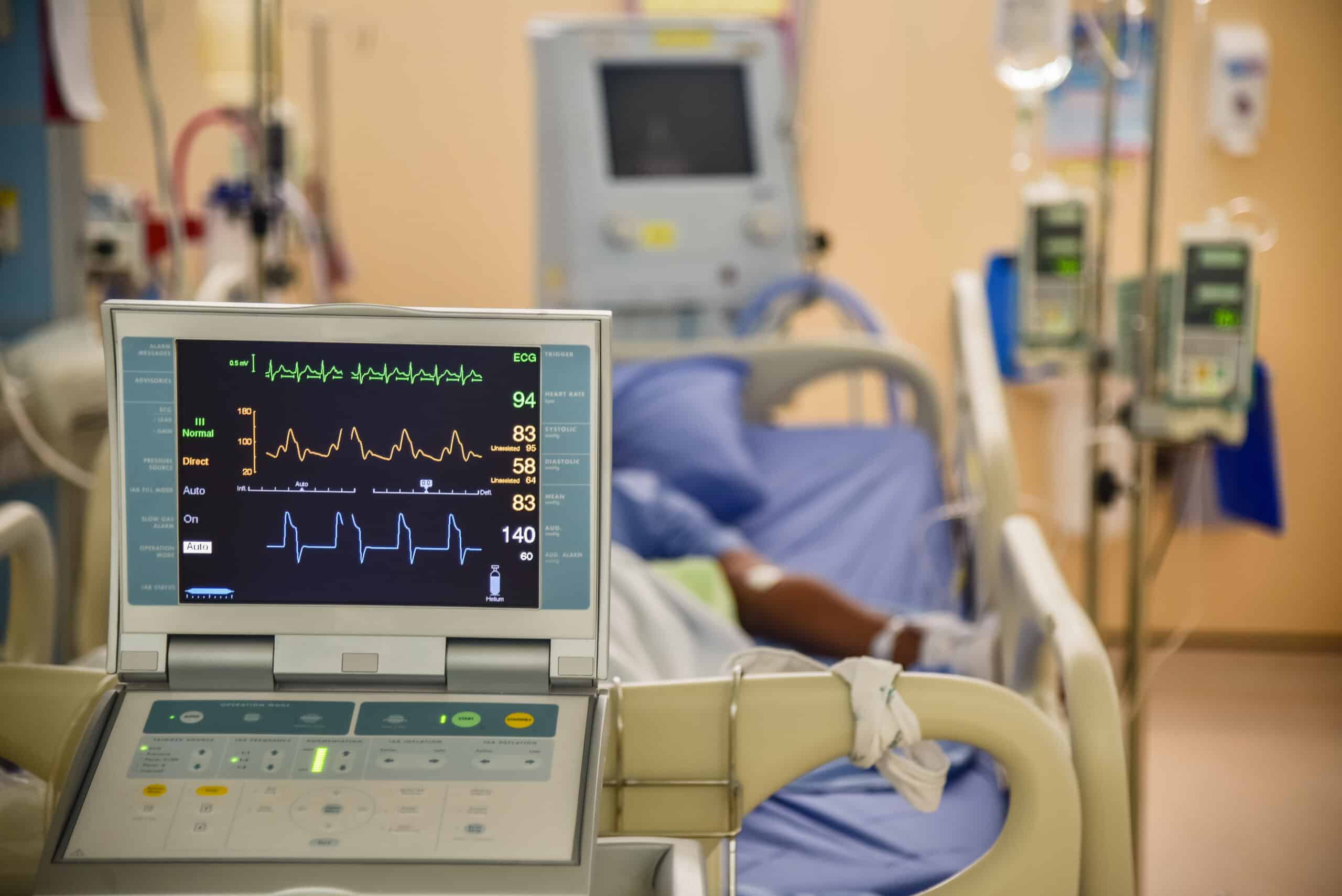 Nursing care for cardiac tamponade - hospital bed and ecg monitor.