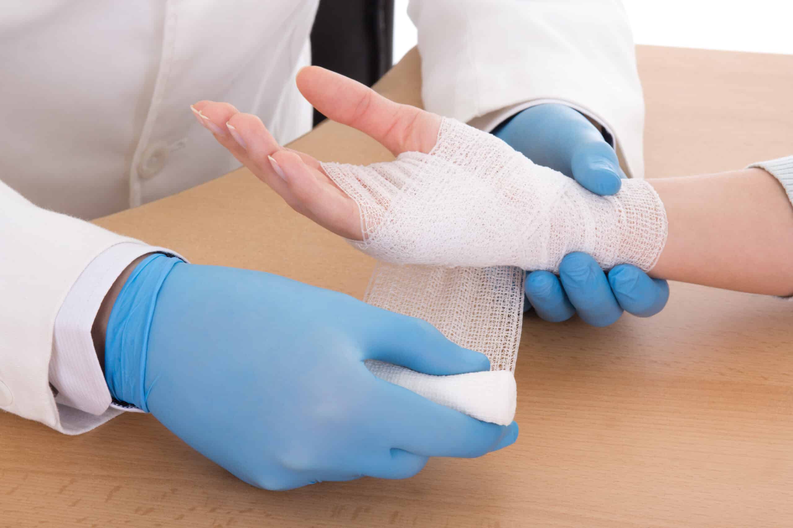 Hand wrapped in gauze.